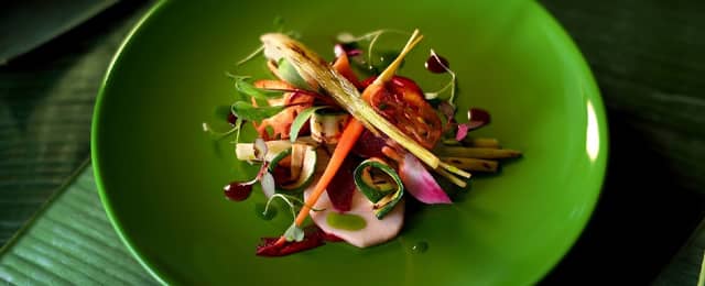 Sustainable vegan dish on leaves by PenniBlack