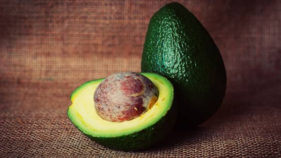 Avocado cut in half.