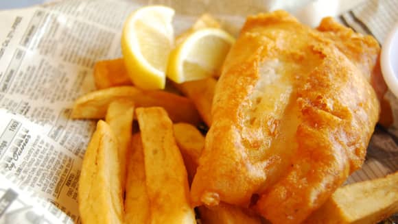 Fish and chips in newspaper.