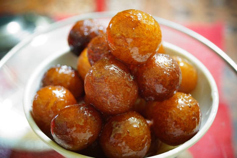 A bowl of Gulab Jamun.