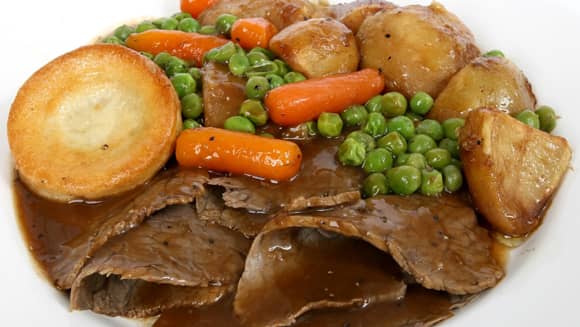 Sunday roast dinner with veg and Yorkshire pudding.