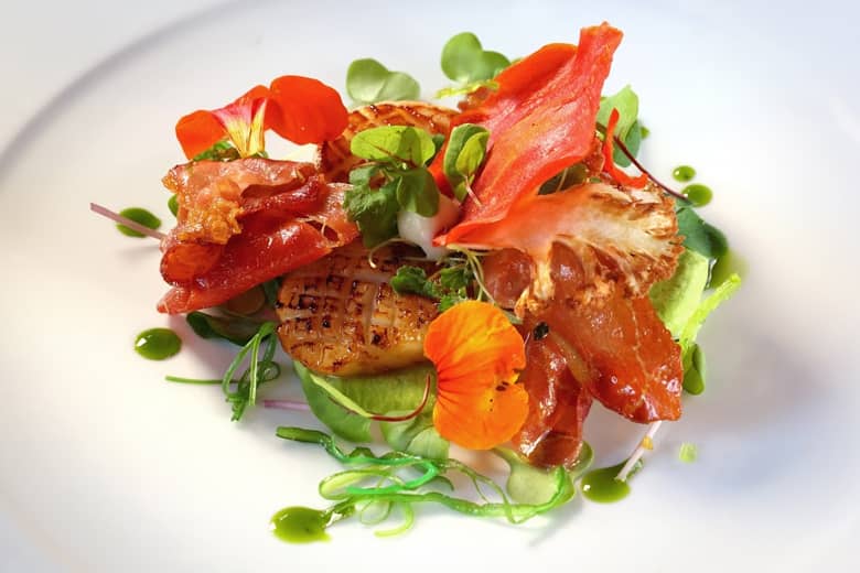 Scallops, crispy pancetta, pea shoot and micro cress salad by PenniBlack.