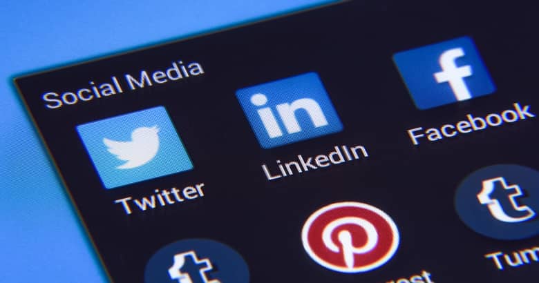 Mobile device home screen with social channels.