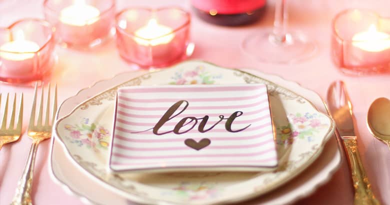 Table set for Valentine’s Day with the centre plate which says Love.