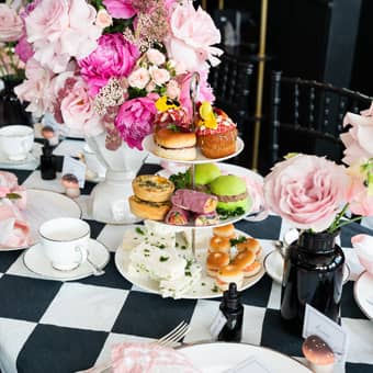 Afternoon Tea 3 Tier presentation with flowers.