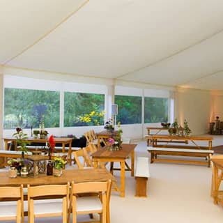 The event setup showing decorated tables with wild flowers and lanterns.