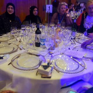Guests seated awaiting the feast.