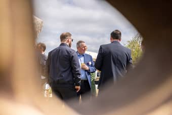 Event guests enjoying a drink.
