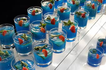 Signature blue mocktail with blue curaçao, elderflower, fresh lime and soda.