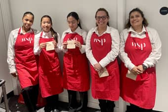 The PenniBlack Team in themed staff uniforms.