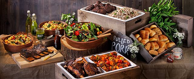 Delicious barbecue catering with mains, sides, and salads by PenniBlack.