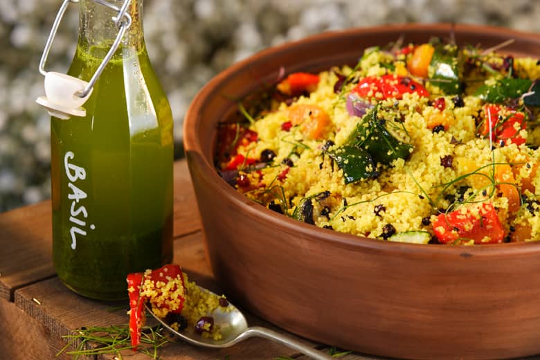 Cous cous salad with basil dressing.