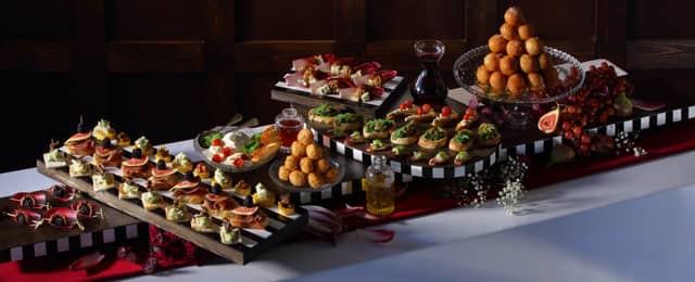 A Venice inspired finger buffet arrangement of savoury and sweet items.