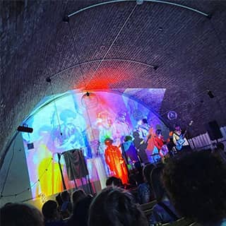 Live music performance at AMP Studios.