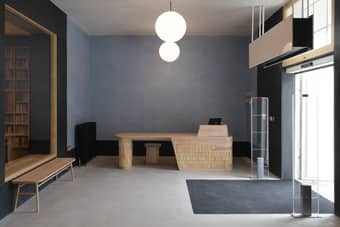 The welcome desk in the daylight filled lobby.