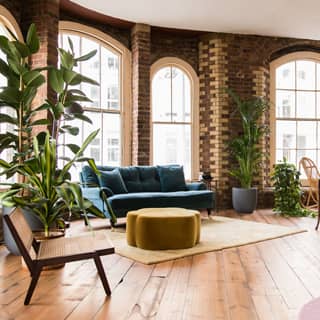 Modern design meets industrial elements at Menier Lounge.